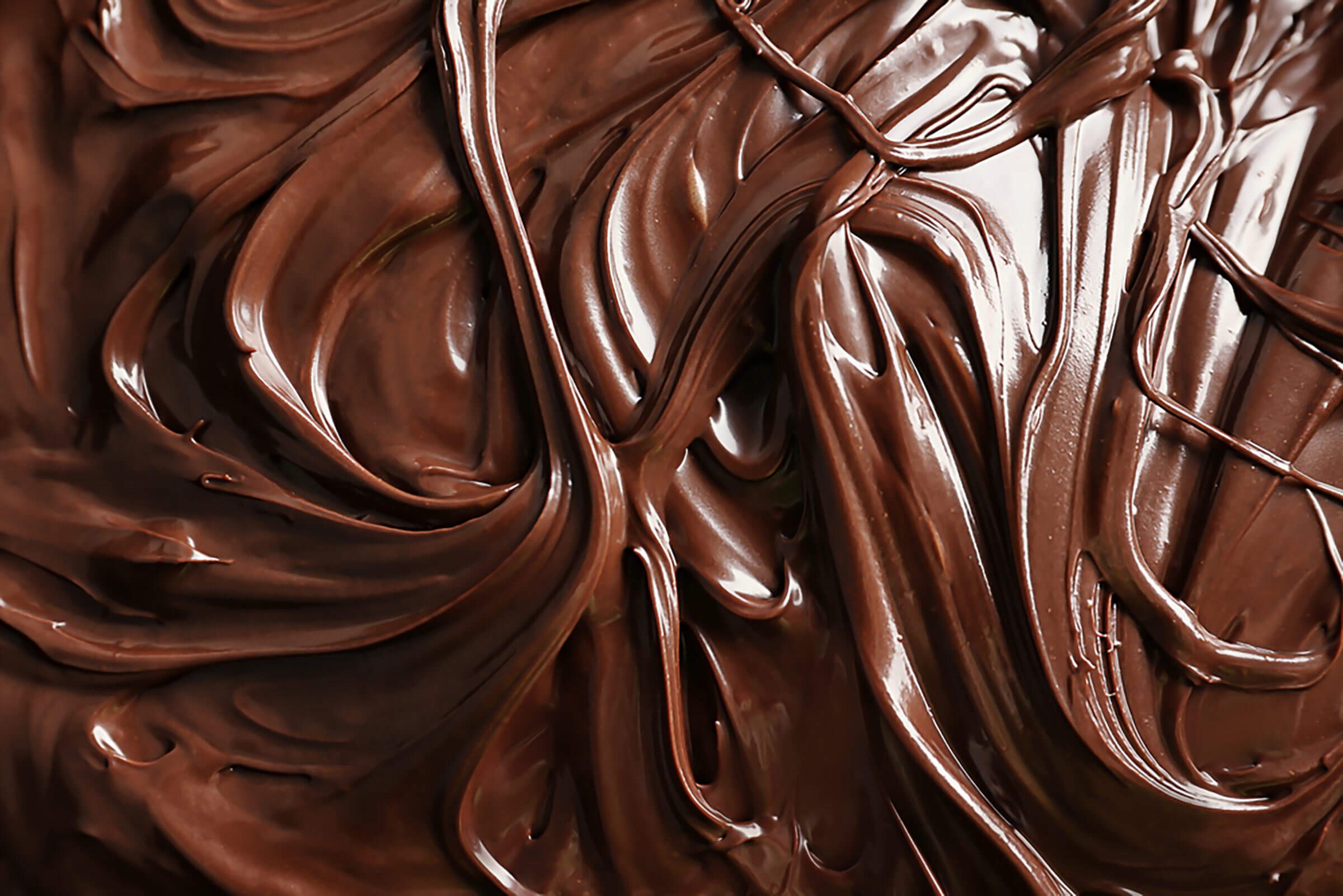 close up of swirled melted chocolate