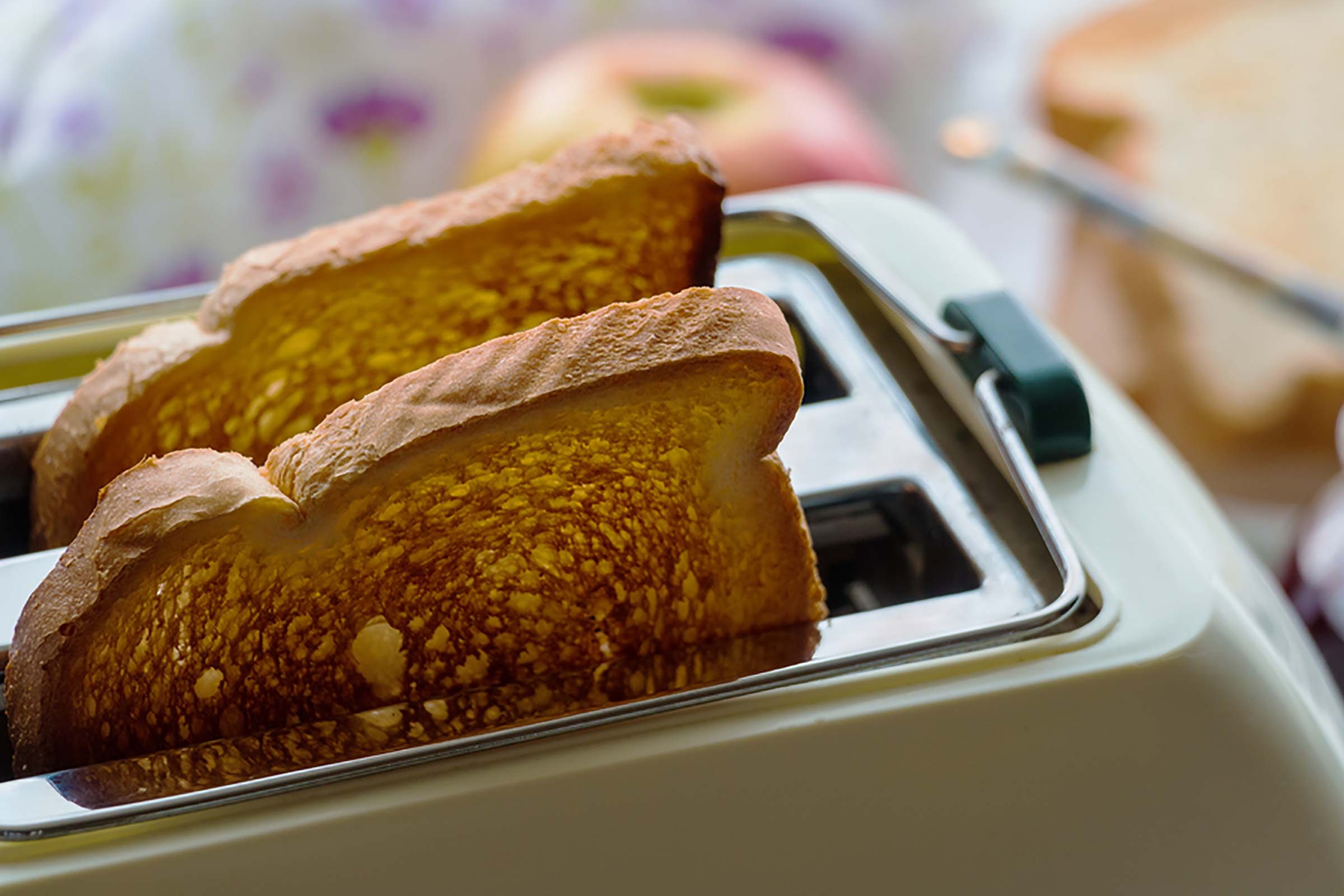 Toast popping up out of toaster