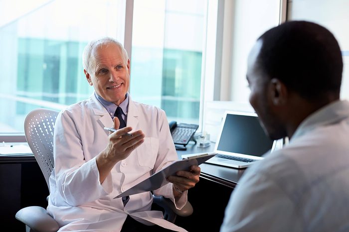 Doctor talking to patient