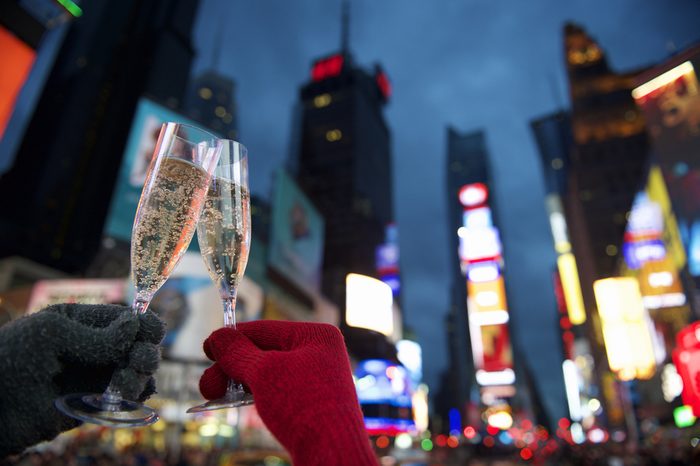 Happy New Year champagne toast couple in Times Square New York City