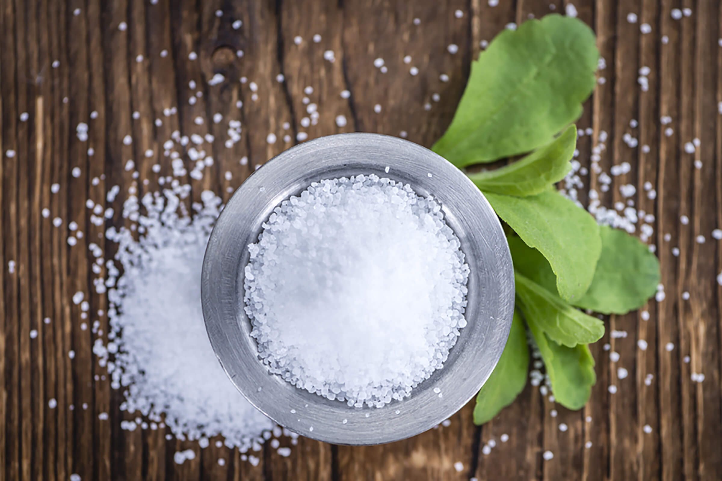 Sweetener in cup with herbs