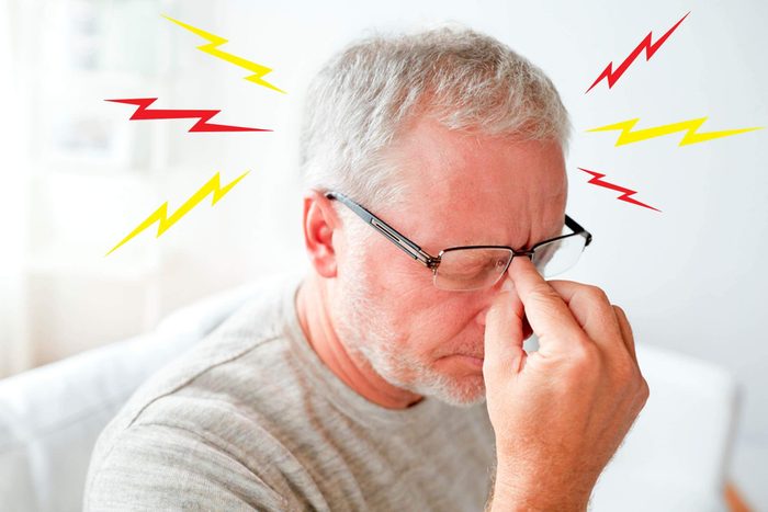 senior man with headache