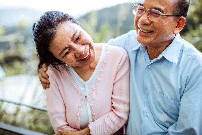 senior couple smiling and laughing together