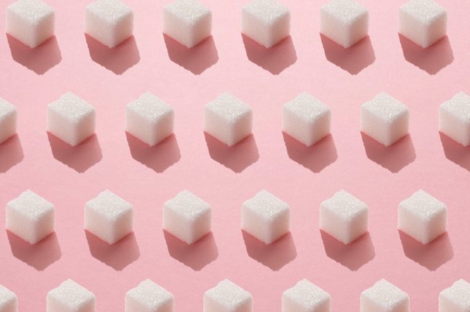 sugar cubes repeated on light pink background