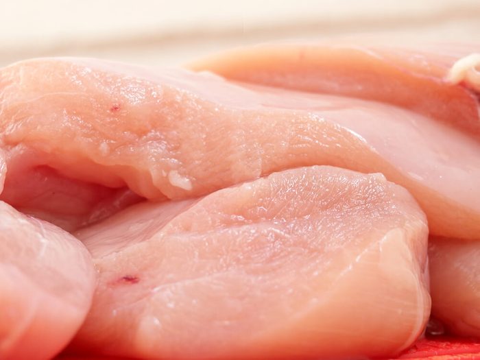 Raw chicken fillets close-up