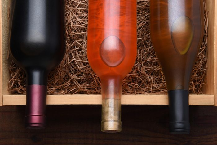 three bottles of wine of different varietals