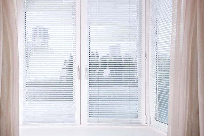 Horizontal image white Window with Venetian Blinds, Designer Blinds around the edges