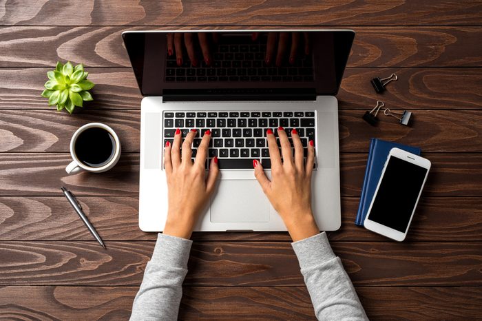 Overhead shot of woman working on laptop