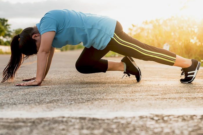 Asian women cardio exercise "Mountain climber".