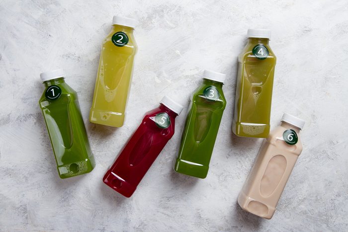 plastic bottles of detox juices