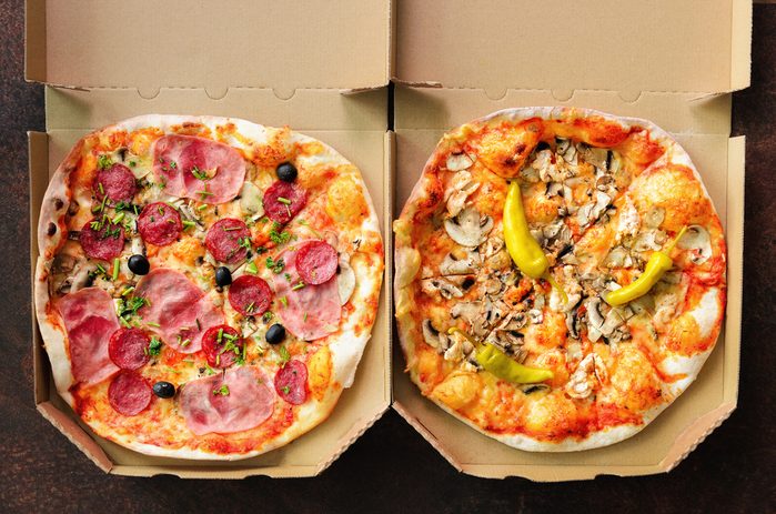 pizzas in delivery boxes