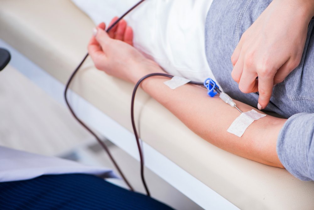 Patient getting blood transfusion in hospital clinic