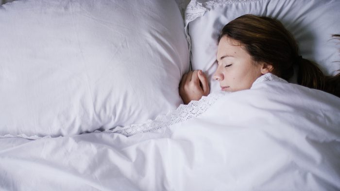 woman sleeping in bed
