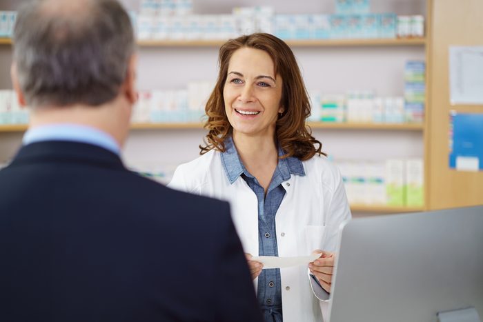 pharmacist talking to customer