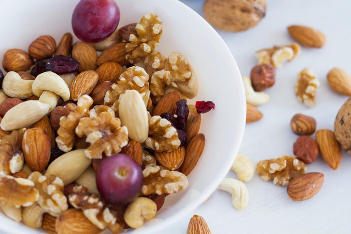 mixed nuts and grapes in a bowl