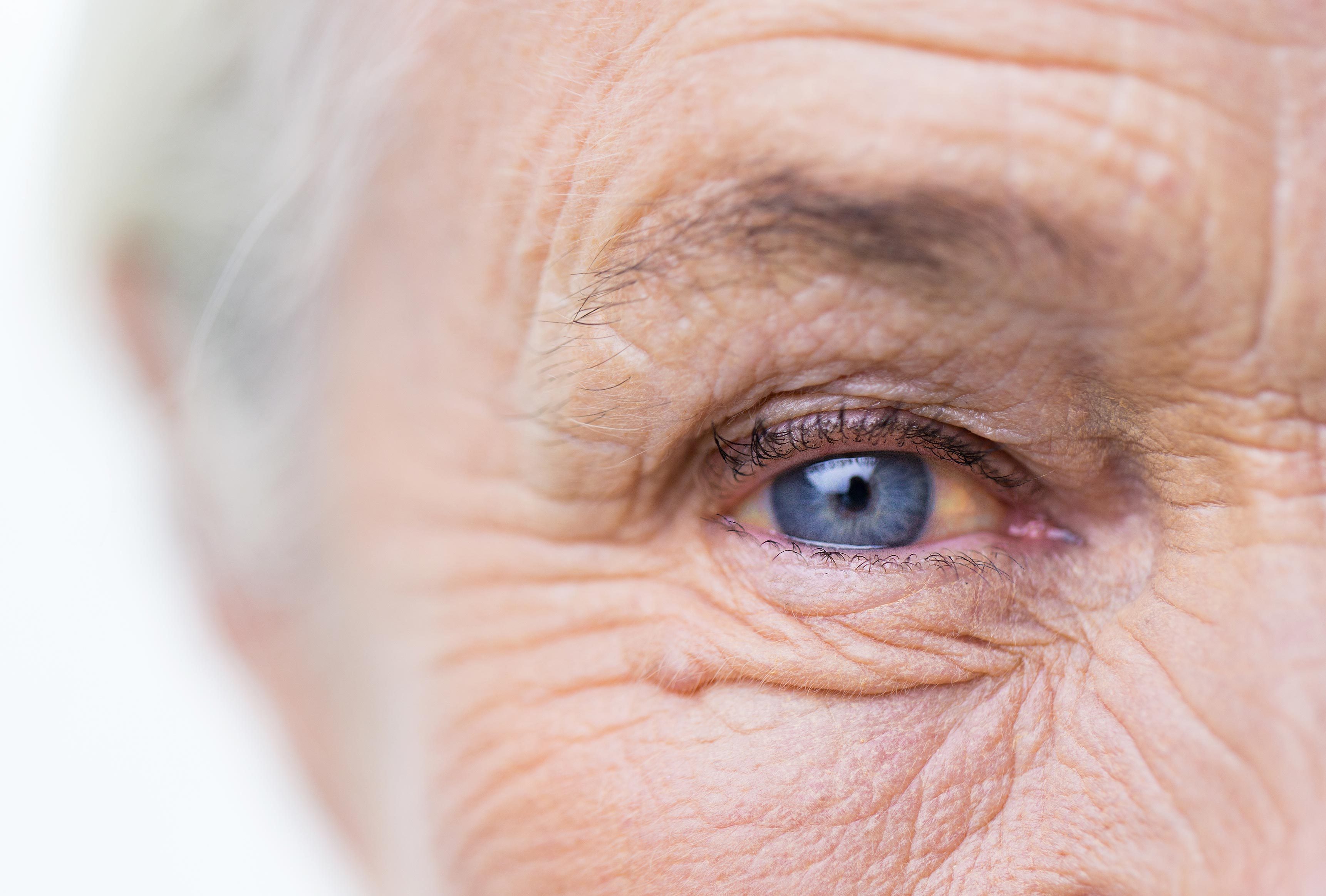 older woman blue eye closeup