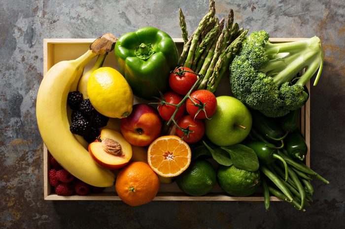 wooden crate full of fresh vegetables and fruit