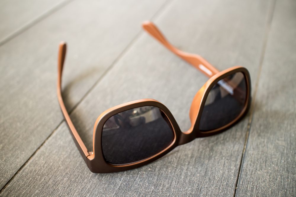 sunglasses on wooden table
