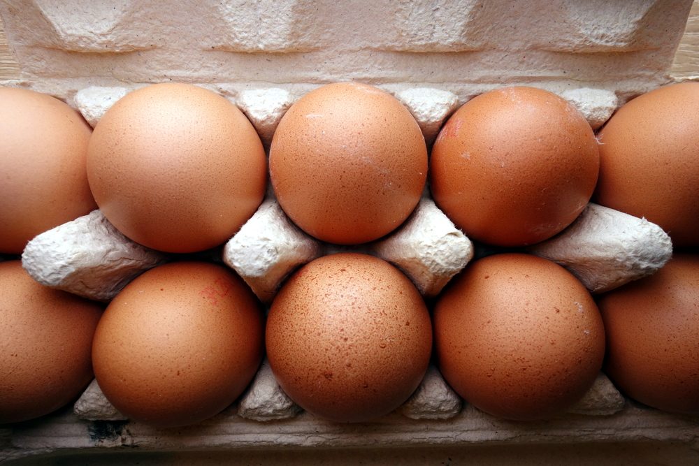 Organic eggs in a cardboard carton