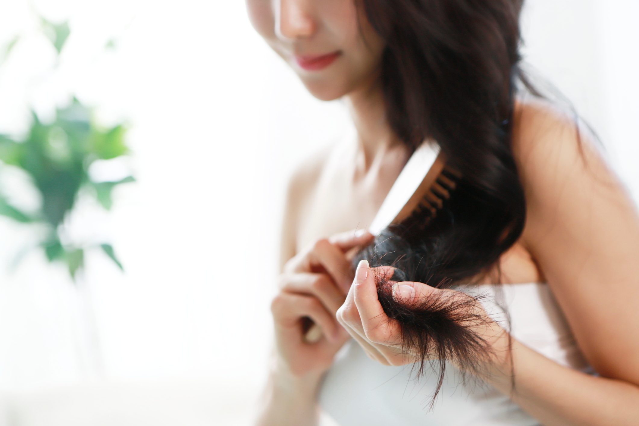 woman brushing her hair