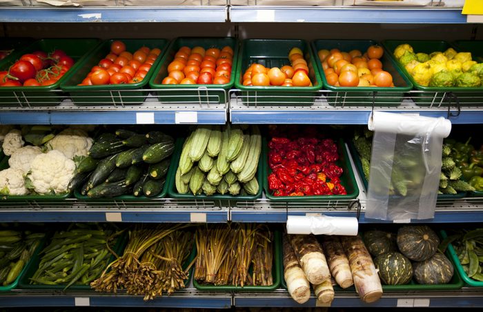 Various vegetables on shelves in grocery store
