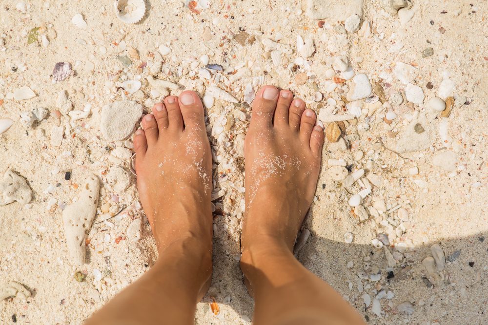 bare feet in the sand