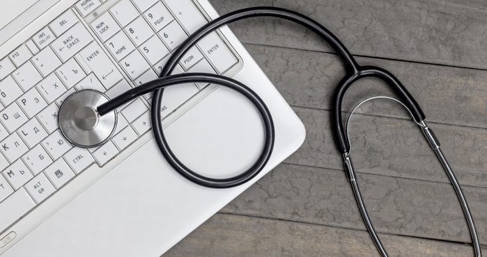 top view of stethoscope on laptop