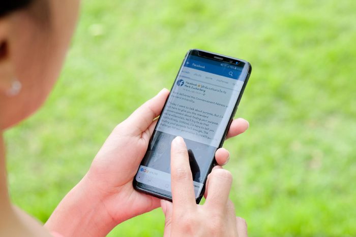 November 30, 2017 Bangkok, Thailand Women use mobile internet application facebook on smartphone Facebook is social networking service.