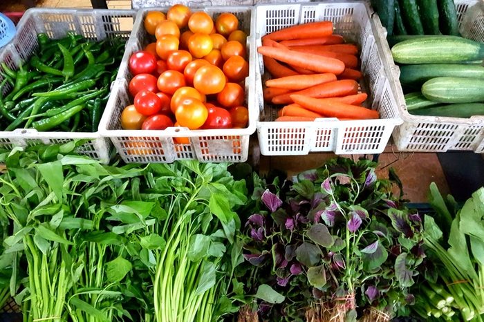 Various vegetables on sale at a market.