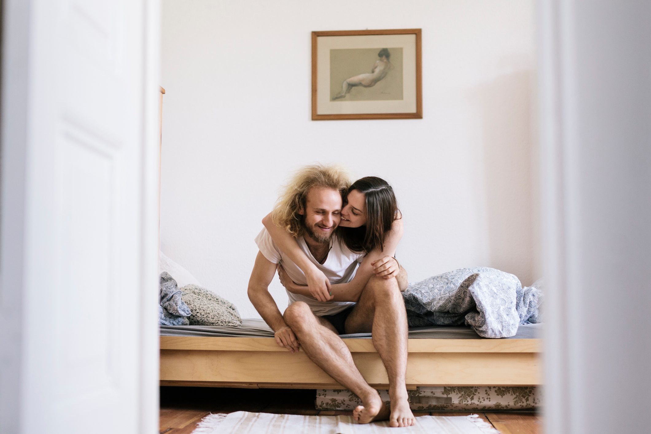 couple in bed together in the morning