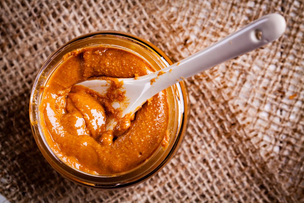 almond butter in glass jar 