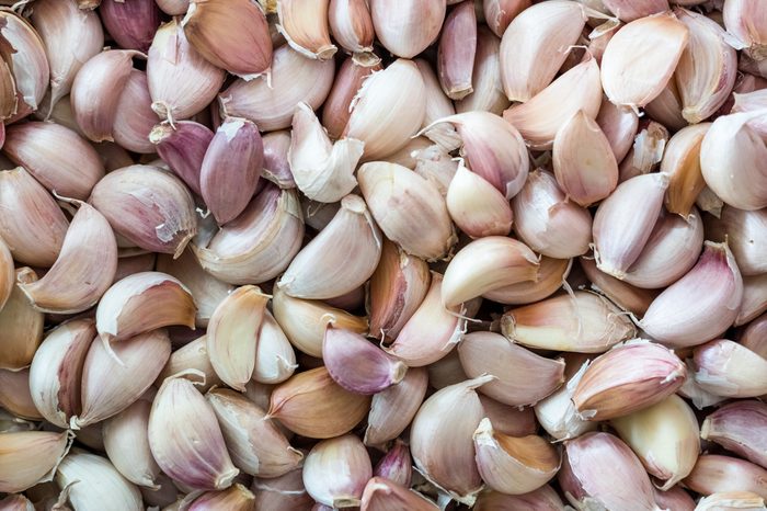 Pile of fresh, unpeeled garlic.