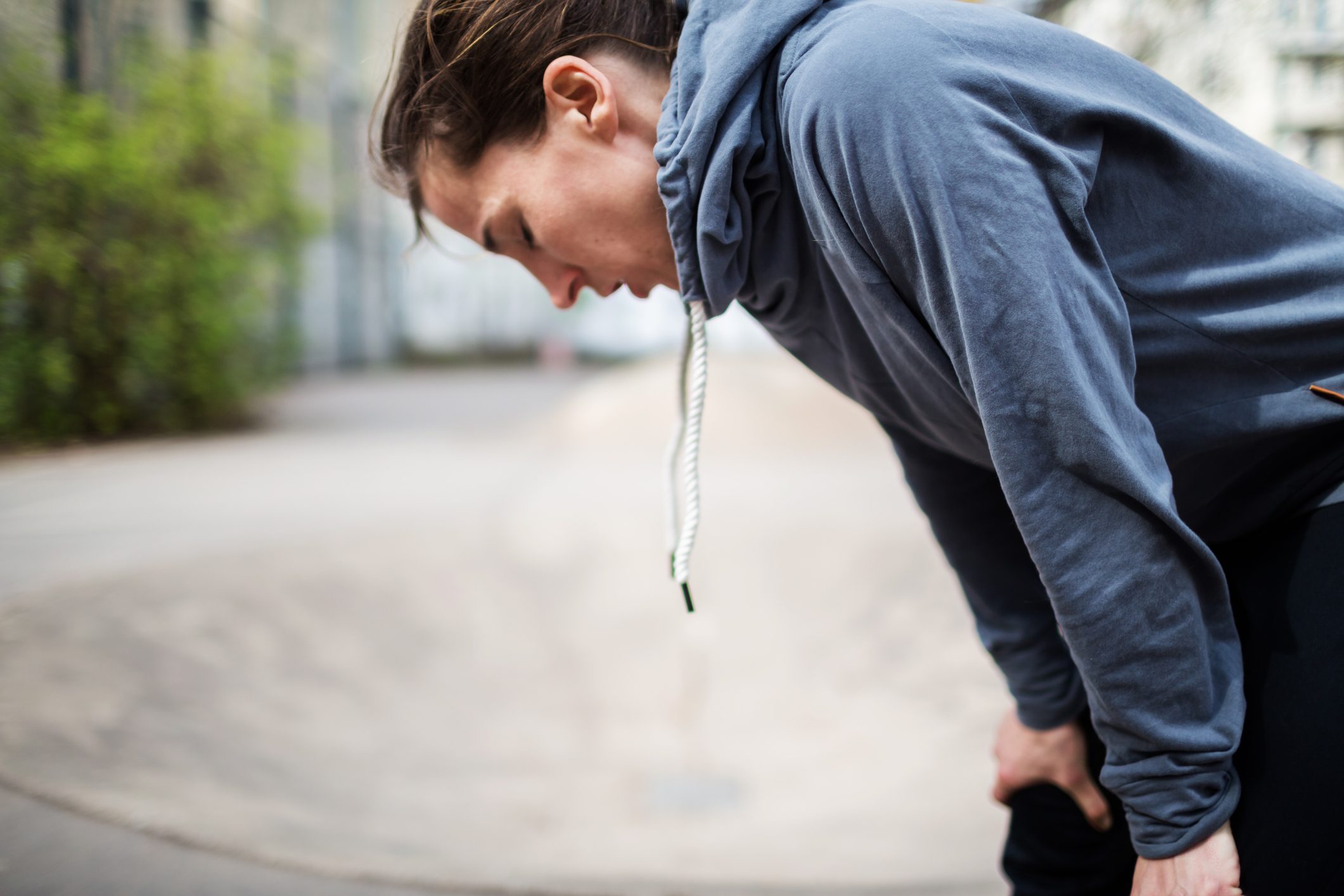 woman having trouble breathing