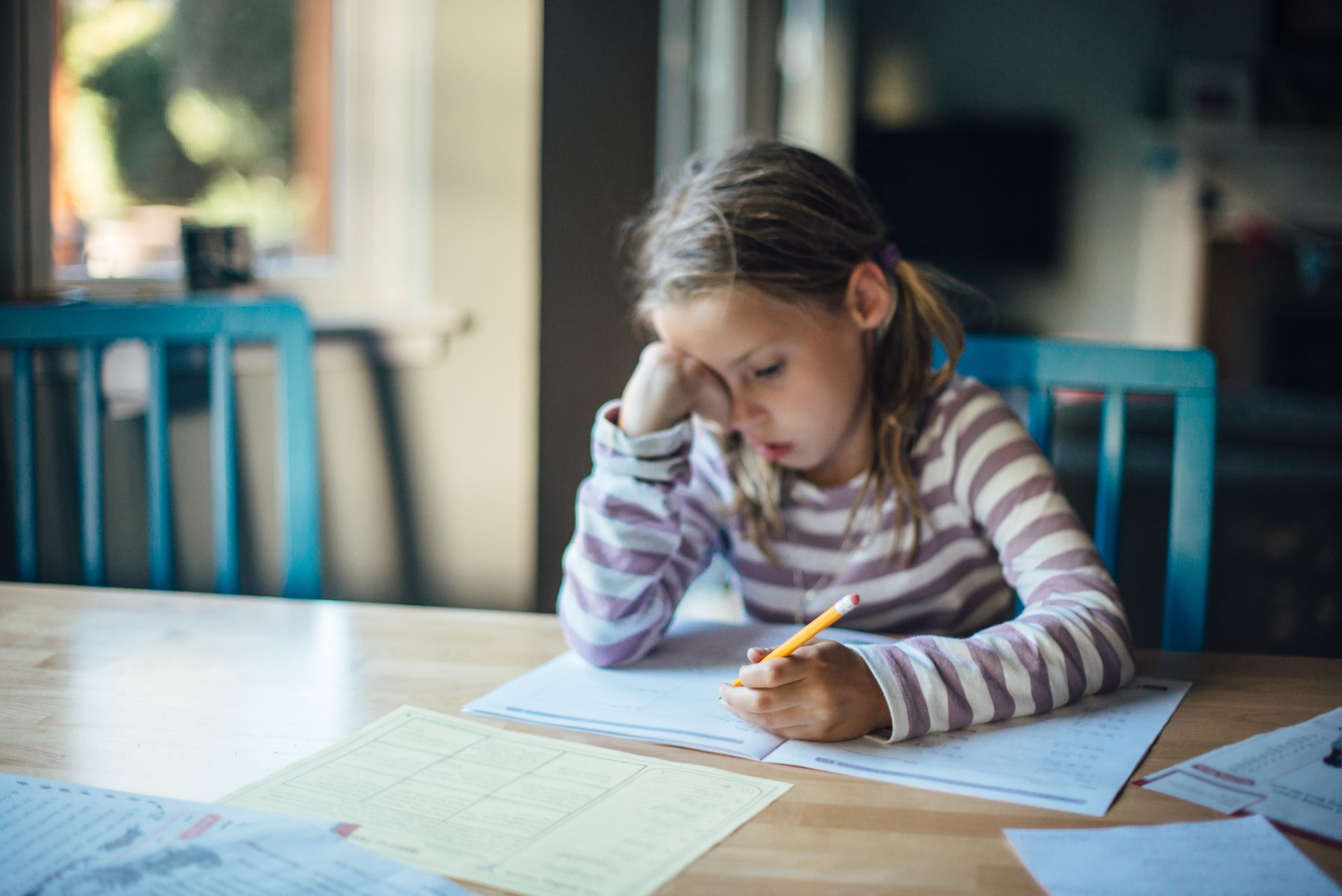 young girl doing homework