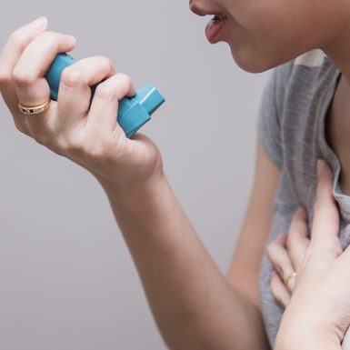 cropped shot of woman holding inhaler for COPD
