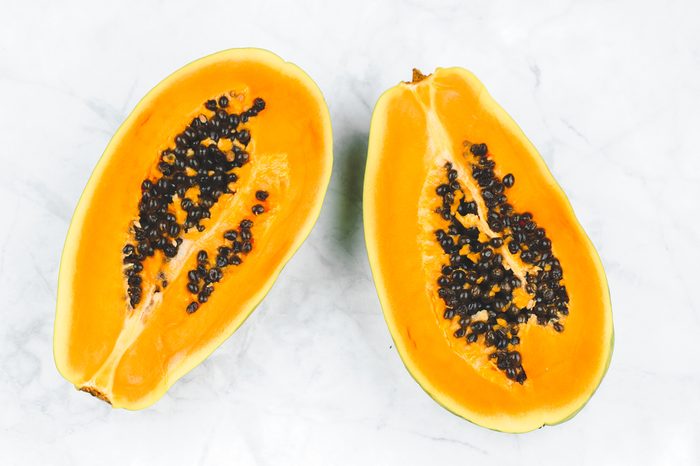 Fresh papaya cut in half