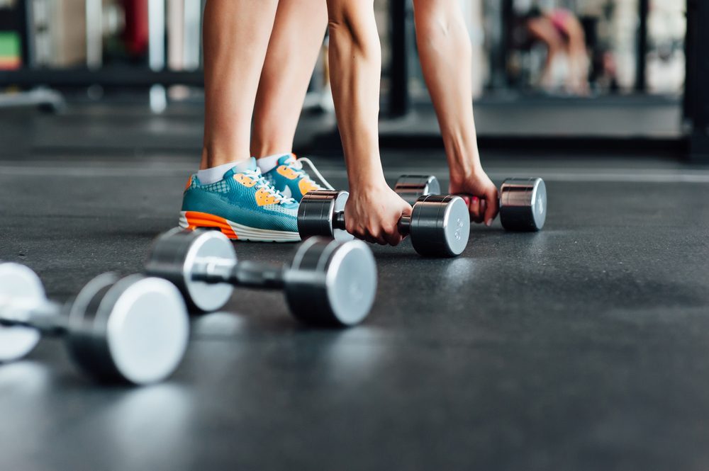 woman lifting weights