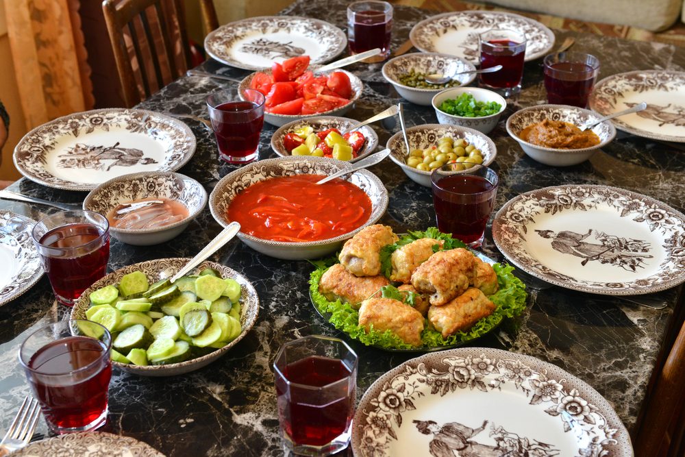 festive table with lots of food and drinks