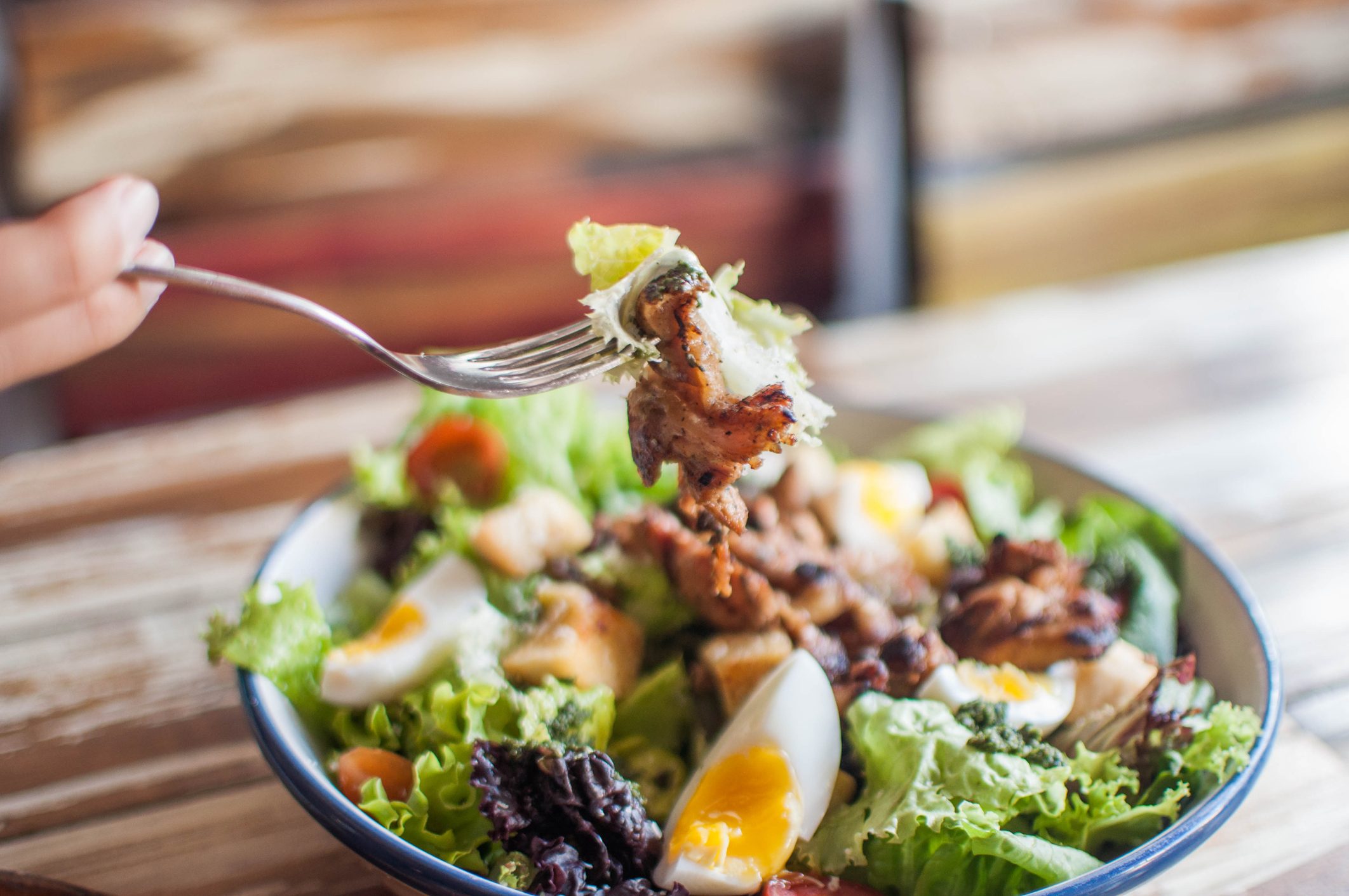 close up of salad on a fork