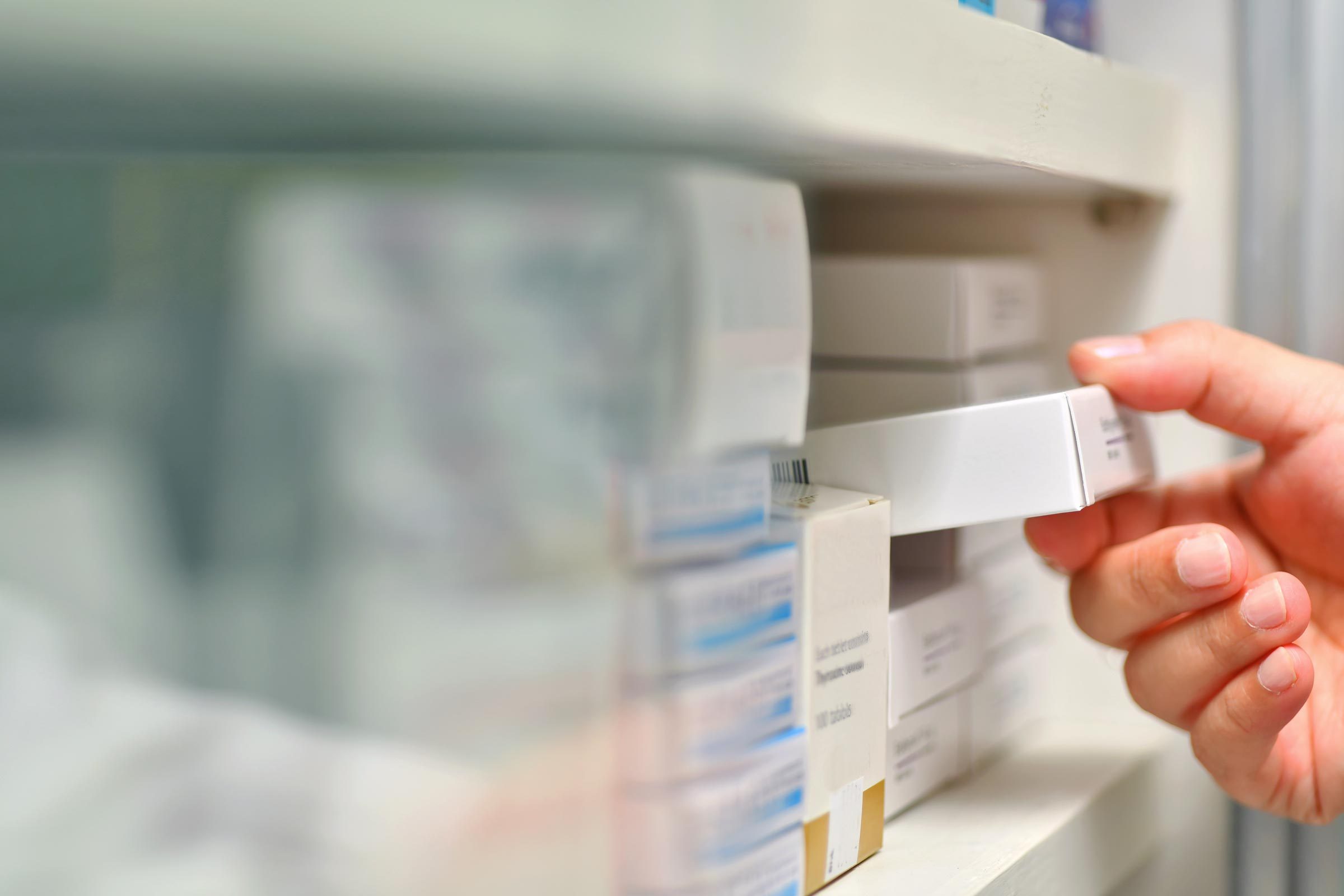 pharmacist choosing medicine