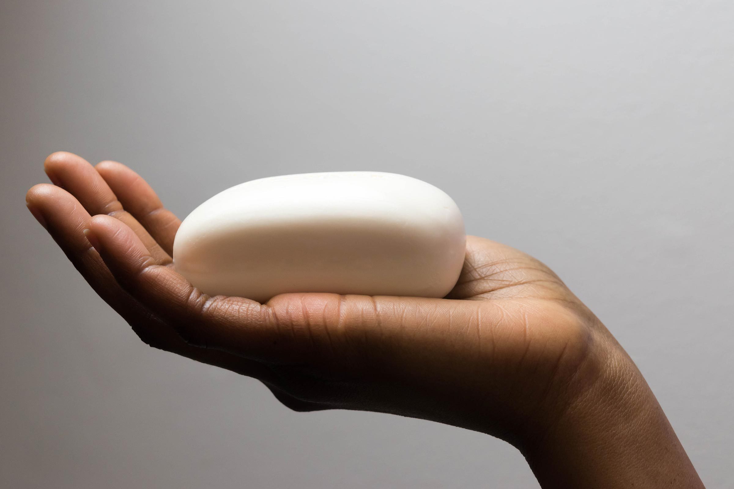 hand holding a bar of soap