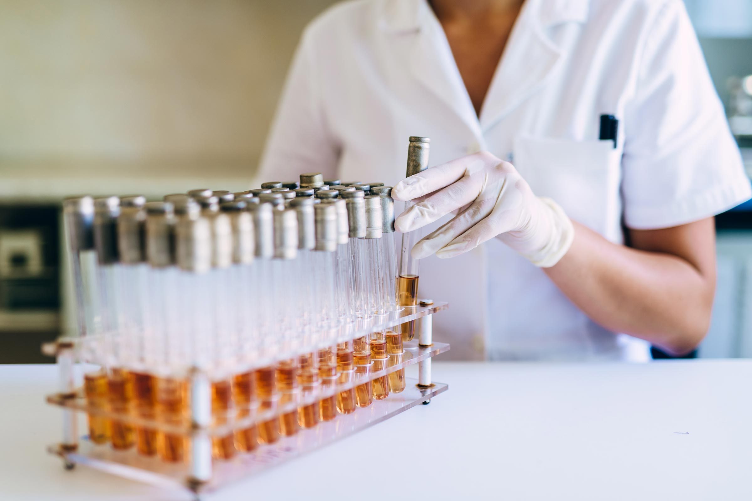 lab technician working with test tubes
