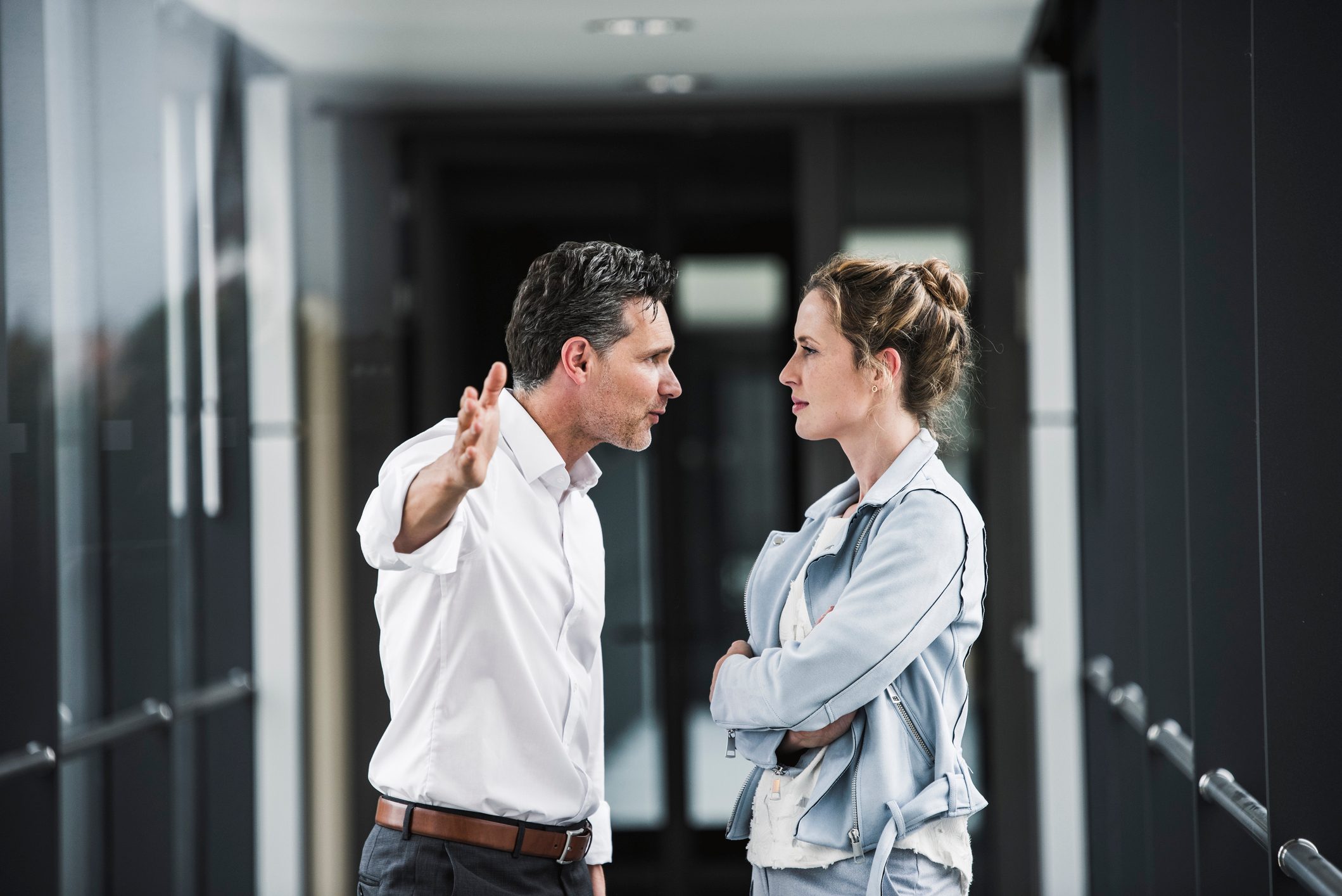 businessman and businesswoman arguing