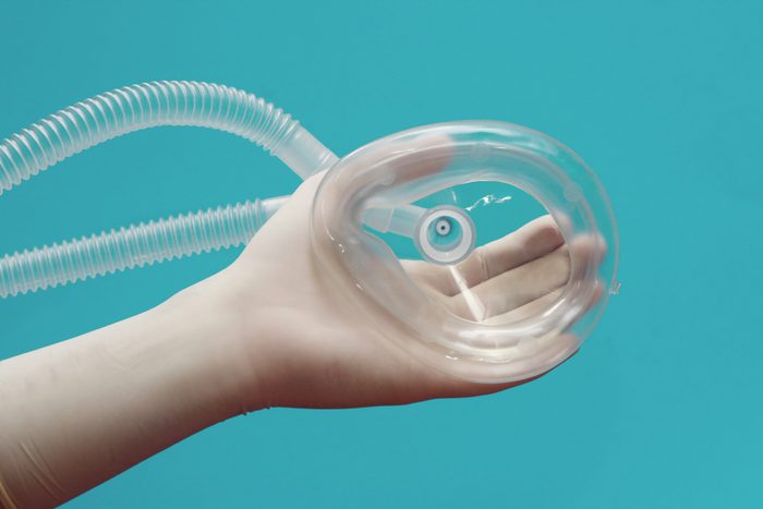 medical gas mask on blue background