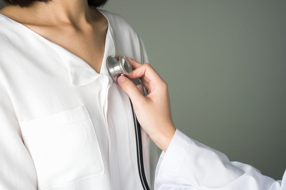 Doctor is using a stethoscope for patients patient examination. To hear the heart rate, For patients with heart disease.