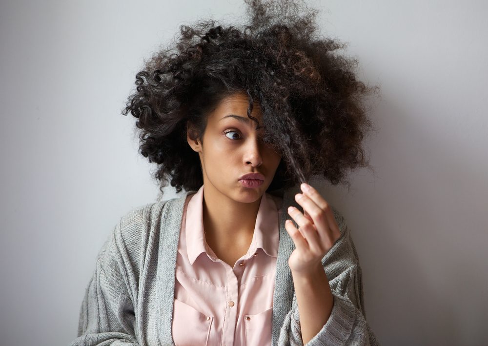 Close up portrait of a girl with thick curly hair