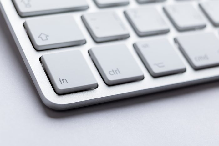 Part angle of light keyboard of the laptop, isolated on white