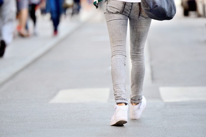 Close up of person walking on street