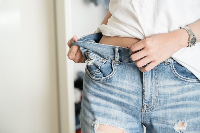 skinny woman body with Loose pants,Light weight body with loose clothes,slender and Healthy body low fat concept.