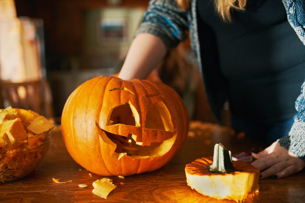 family fun activity - carved pumpkins into jack-o-lanterns for halloween close up